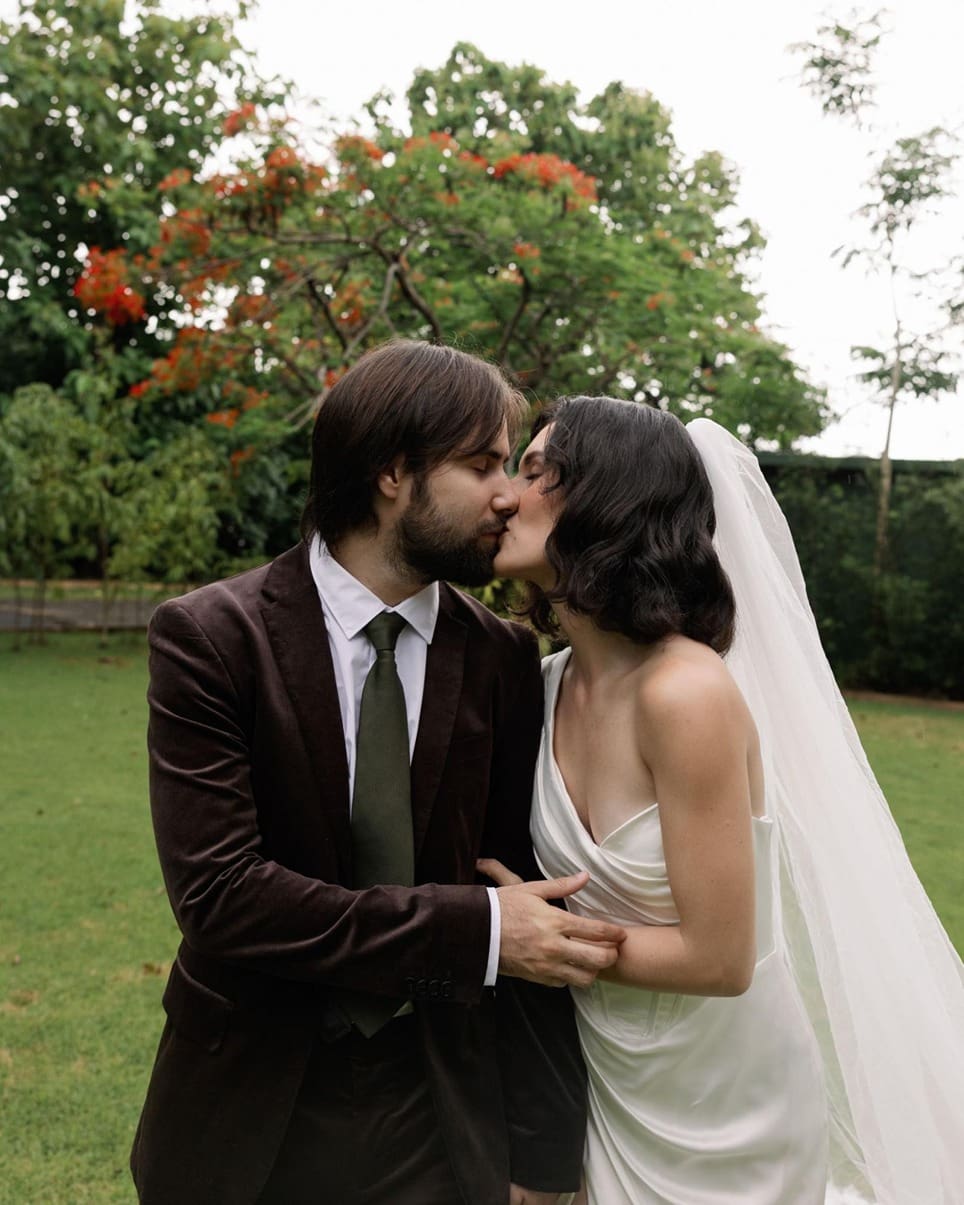 The bride and groom kissing at their San Juan Wedding Venue