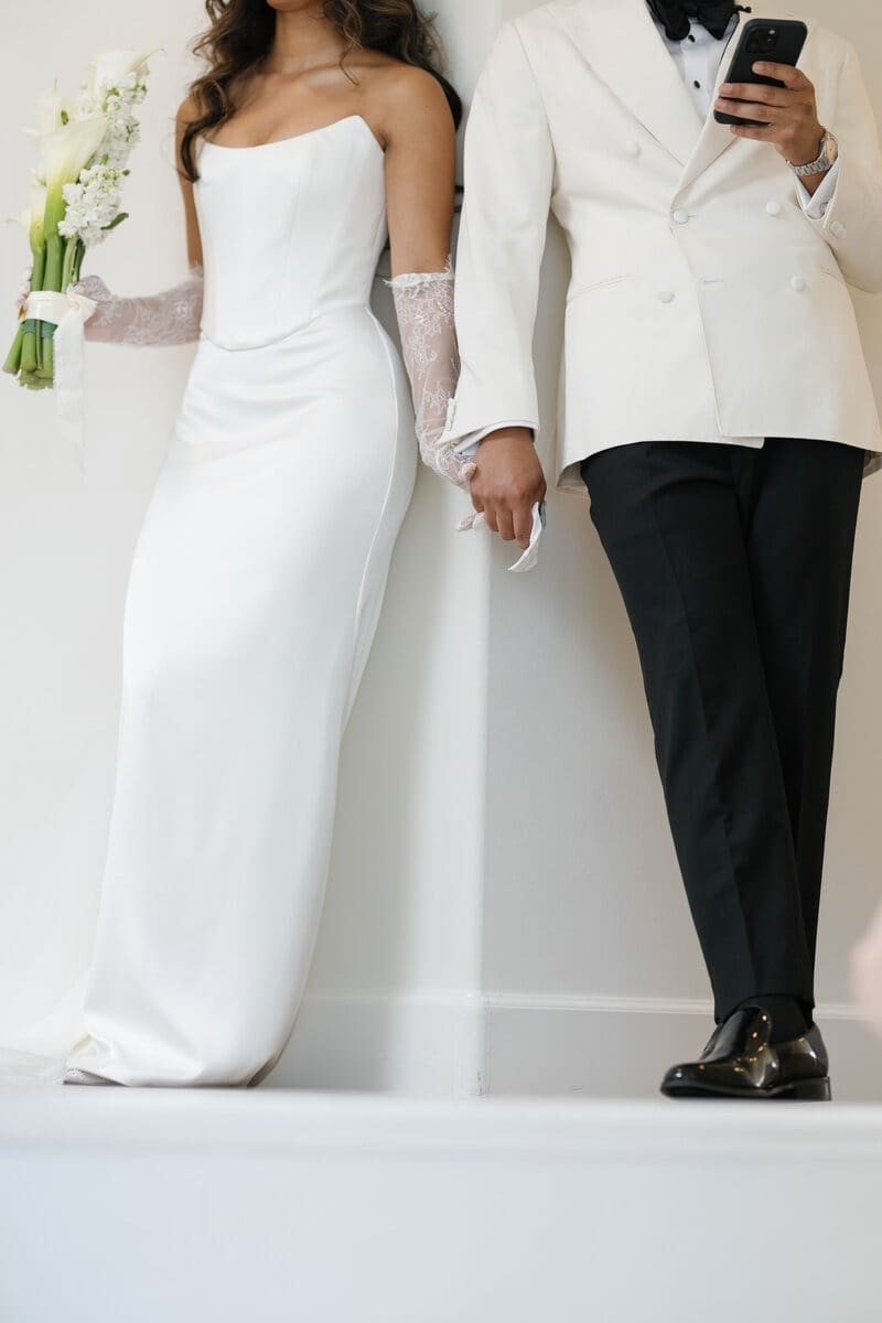 second shooter wedding photography picture of the bride and groom holding hands