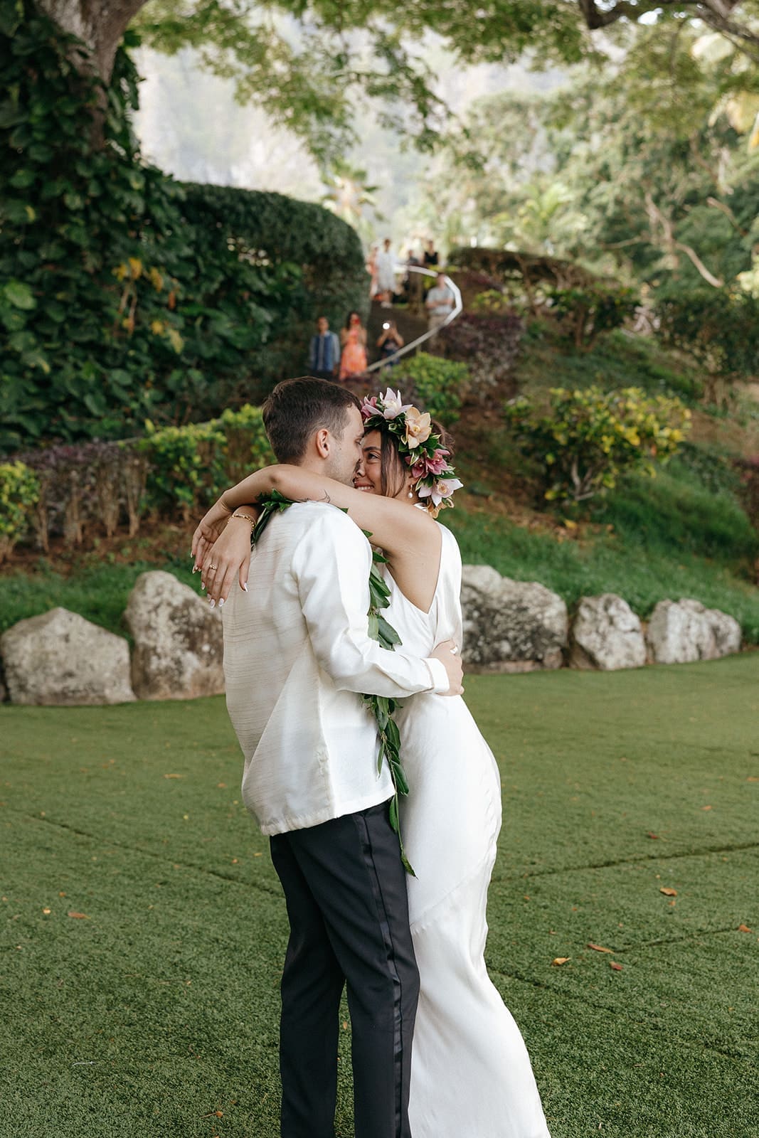 natural wedding photos of a bride and groom smiling at each other during their first dance