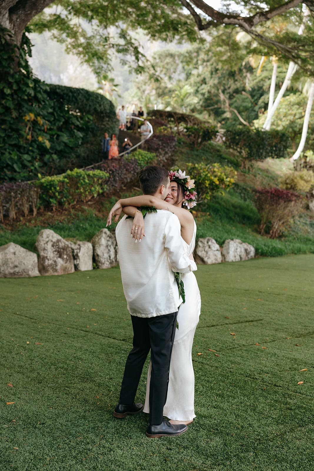 authentic wedding photos of a bride and groom sharing their first dance after getting married