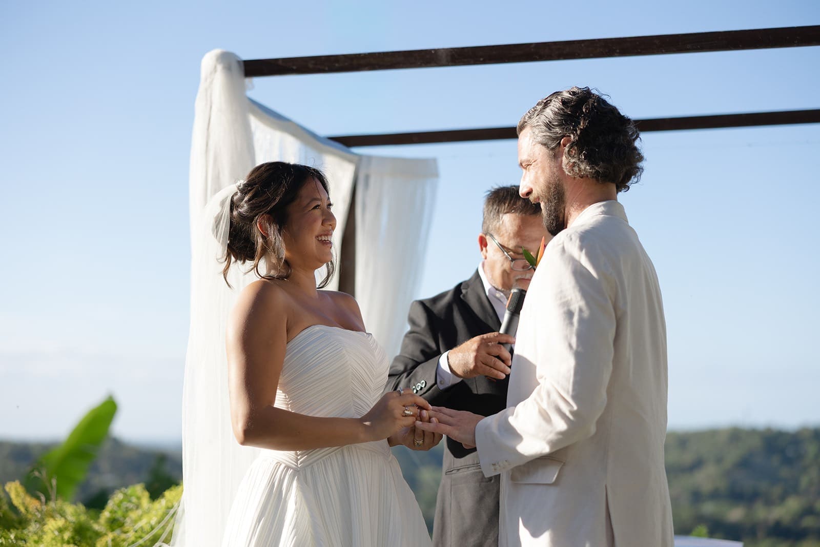 portrait of a bride and groom during their ceremony at one of the most beautiful rincon wedding venues